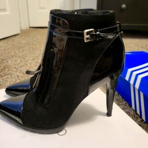 Calvin Klein booties. Gently used. size 8. Black patent leather fringe suede.